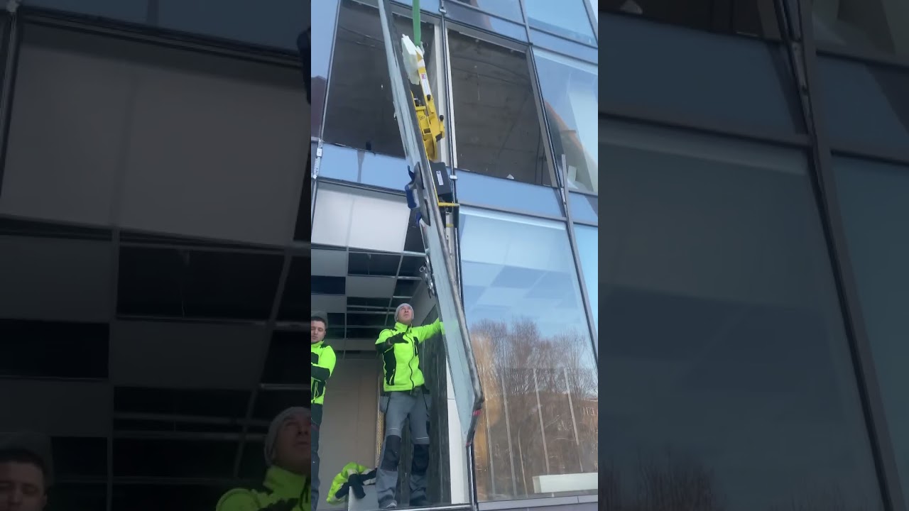 Skyline Glass Upgrade: Office Building Window Replacement in Riga with Crane and Precision