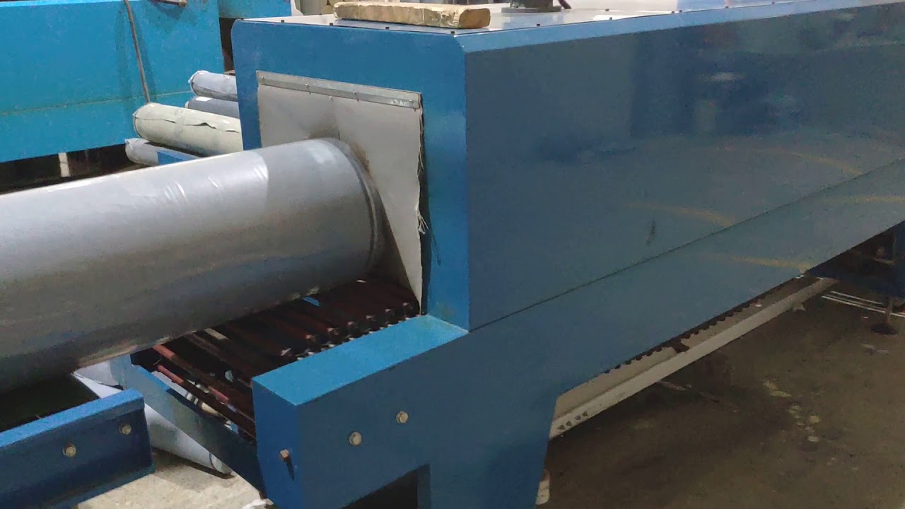 Suntech Automatic Fabric Roll Packing Machine Running In Rajby Textile ...