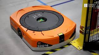 アマゾン茨木ＦＣを公開　ロボットが倉庫を駆け巡る