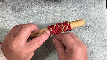 Tying Gaucho on the ends and herringbone in the center of a 13 Part 4 Bight Casa Knot.