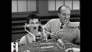 The owner sees a demo of the automatic lunch feeder on one of his workers