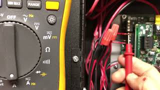 How to test NAC current with a multimeter