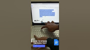 How to strike through text in google docs?