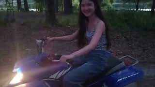 my daughter learning how to drive the Yamaha blaster 4 wheeler