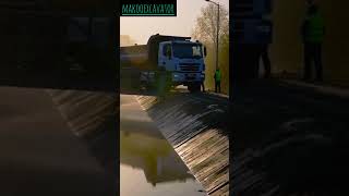Articulated Dump Truck Crossing Bridge #DumpTruck #MorningFog #shorts