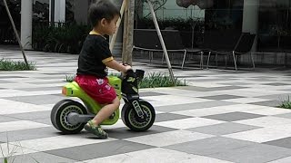 Kids bike and riders playing happily outdoors