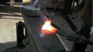 Blacksmithing - Forge-welded square-corner on flat bar.