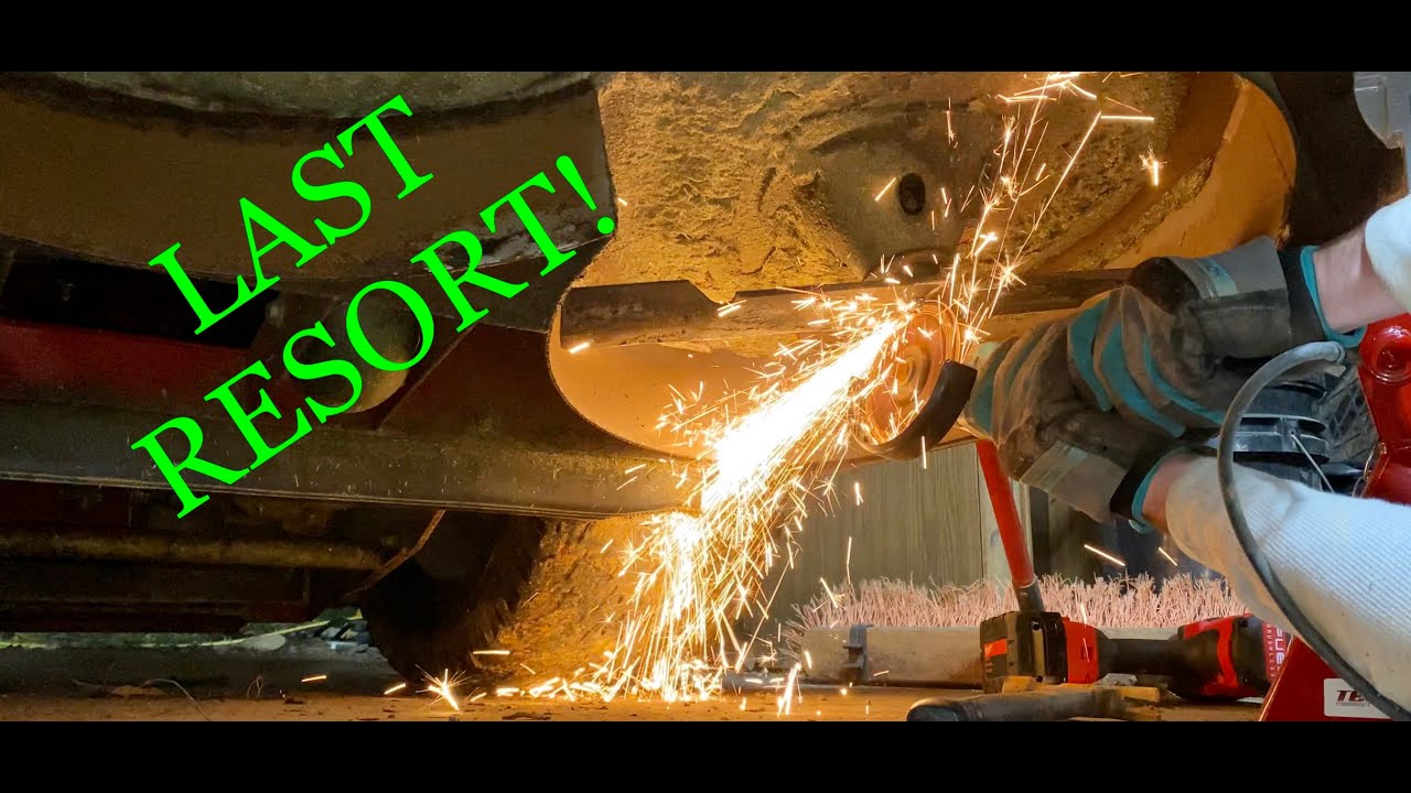 Getting a stuck mower blade off! FINALLY! YouTube