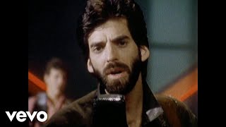 Video thumbnail of "Kenny Loggins - Swear Your Love (Official Video)"