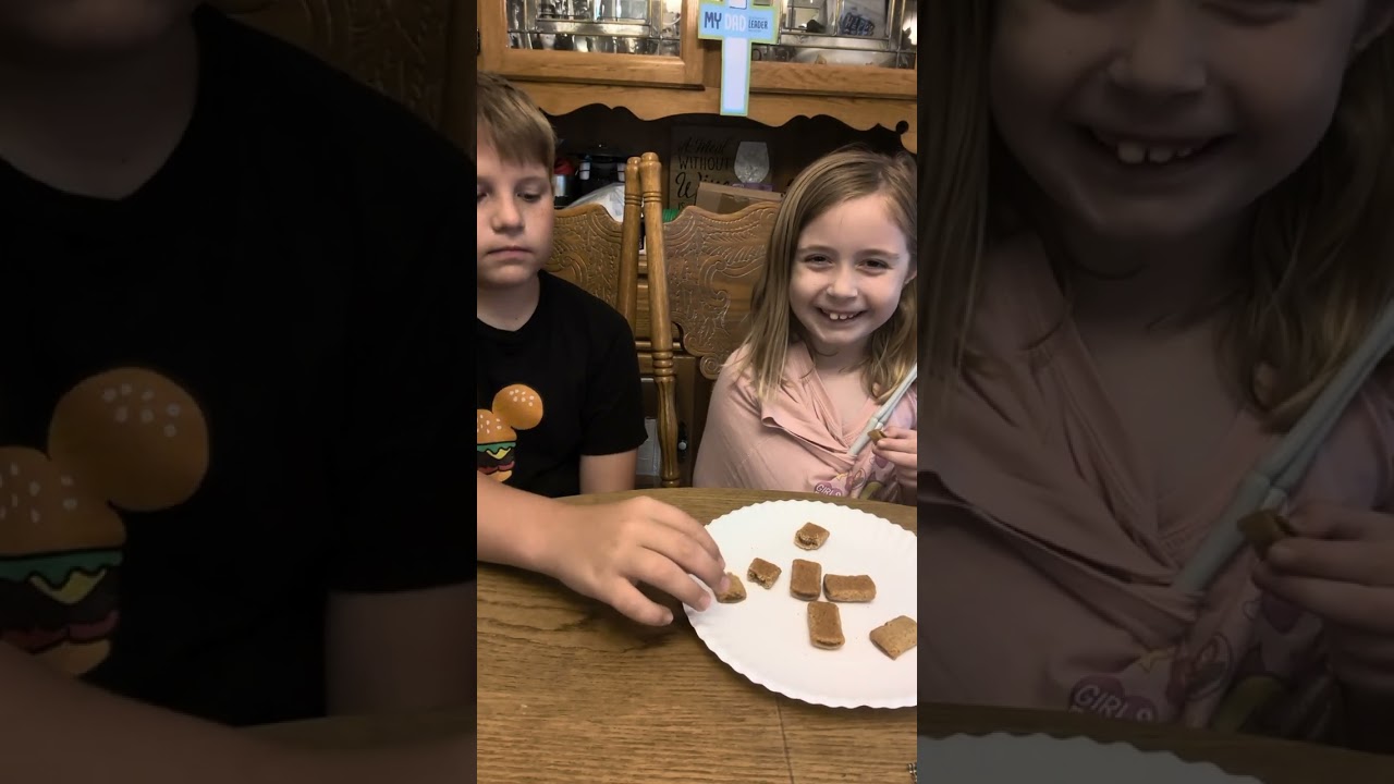 Lexi tries a mini pop tart with TK