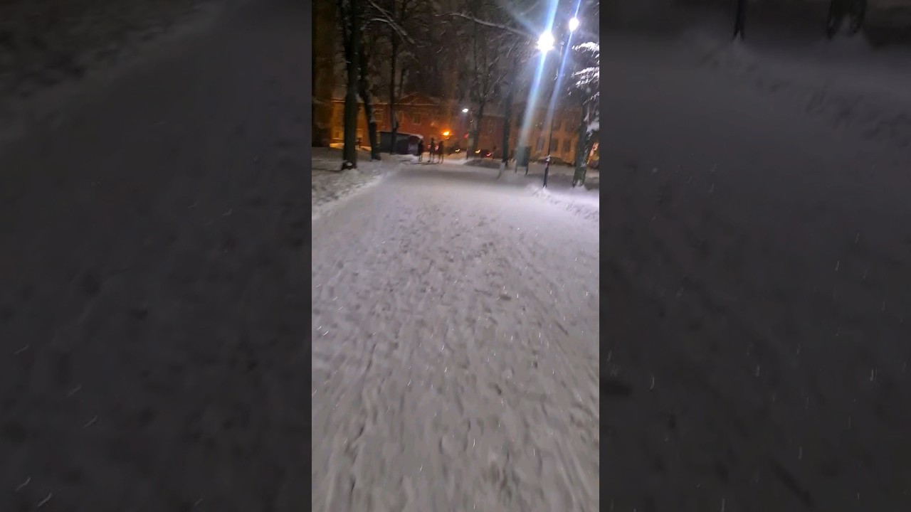 Cycling in snowy day in Latvia 