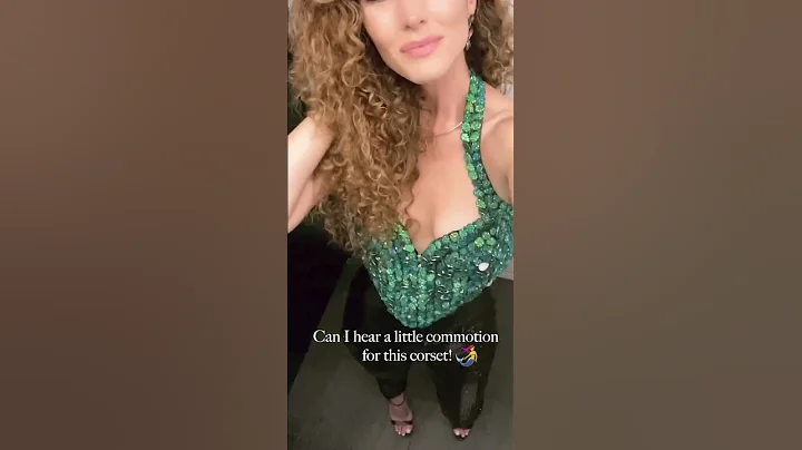 Can I hear a little commotion for this emerald top...