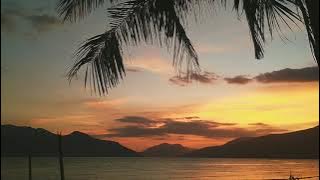 Story Wa terbaru 2021  suasana senja di pantai