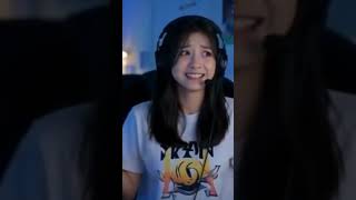 female mobile game streamer named Little G livestreaming a MOBA ranked game,
