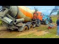 МТЗ-80 вытаскивает Камаз Миксер  Tractor pulls out the concrete mixer