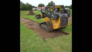 Digging a Drainage Ditch with a Skid Steer #johndeere #skidsteer #farmlife