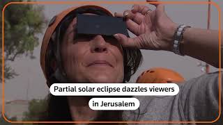Partial solar eclipse dazzles viewers in Jerusalem