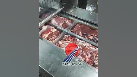 XIAOKANG Thermoforming Vacuum Packaging Machine in one of China biggest slaughter house meat product