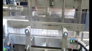 COLLATING AND OVER WRAPPING MACHINE with Roller Sealing
