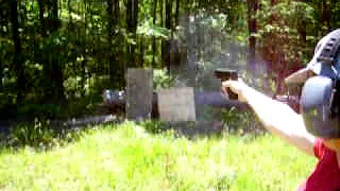 Cynthia fires a Glock 30