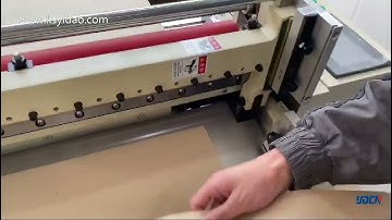 Honeycomb paper roll to sheet cutting machine