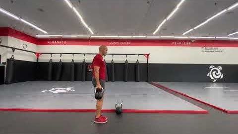 Dual Kettlebell Suitcase Reverse Lunge
