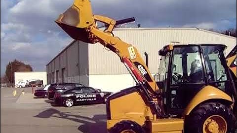 GovDeals: 2011 Cat 420E Backhoe/loader w/4-in-1 bucket (see