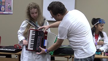 Acoustic accordion hacked using a Roland synthesizer for MIDI voices