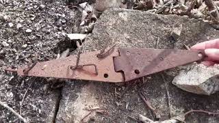 CHECKING OUT BARN SITE REMAINS IN WOODS