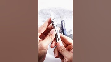 A delicate and compact EDC titanium alloy key chain knife!#fyp #knifeskills #titaniumknife #edc