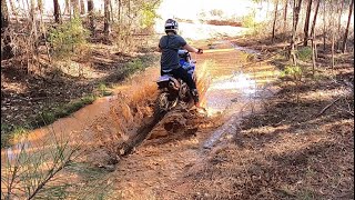 Dirtbike riding through deep muddy trails. Can these motorbikes make it?