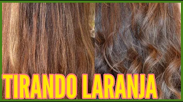 Como tirar o alaranjado do cabelo escuro?