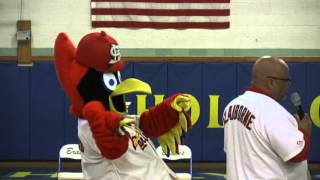 Cardinals mascot Fredbird and broadcaster Mike Claiborne visit Holy Cross Lutheran School