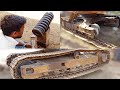 Excavator Track Adjuster Spring Repair And Track Chain Installation Fire Metal 