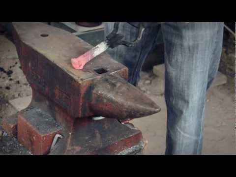 Re: "Forging a plant hanger from a railroad spike.