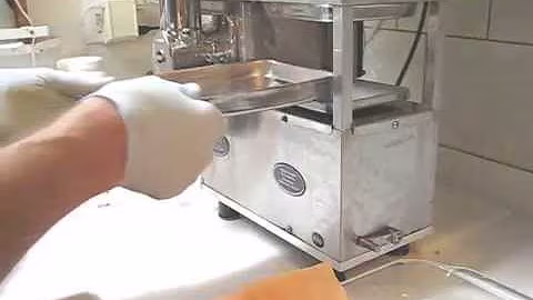 Making vegetable juice on a Whole Health Foundation juicer  A Norwalk juicer alternative