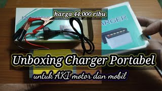 Unboxing Charger Portabel