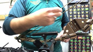 Crossbow center serving a string.