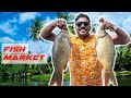       mandya huge  fish market   fish cutting  sea food market