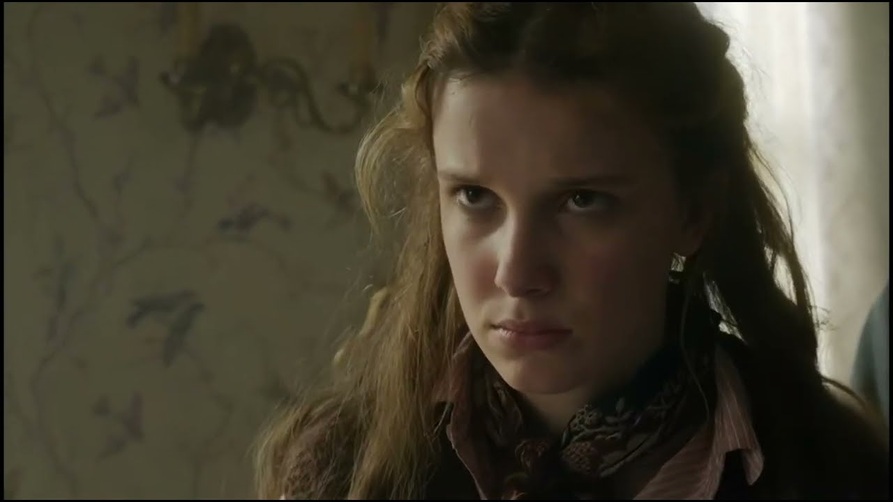 Enola Holmes Millie Bobby Brown kicks bad guy in the balls twice and scrambles his eggs
