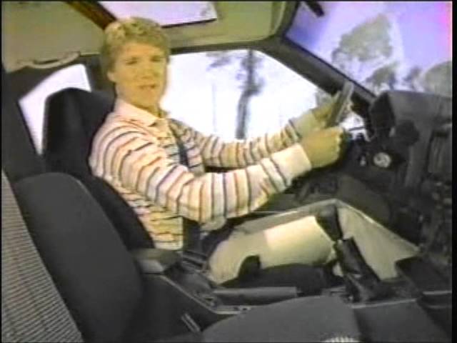 Toyota Commercial with car racer Dan Gurney - 1983 class=