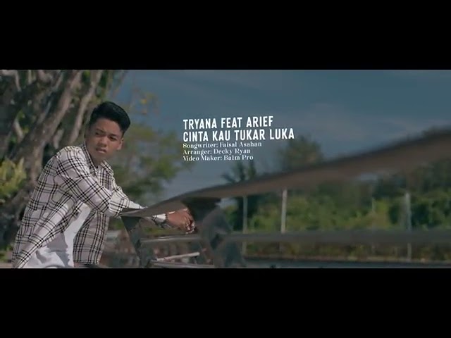 Tryana feat Arief - Cinta Kau Tukar Luka Official Music Video class=