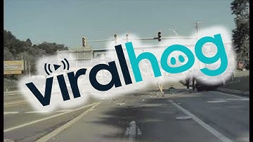 Car Launches into Tesla After Leaving Lane || ViralHog