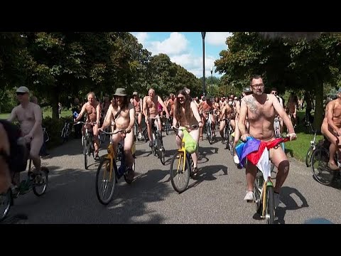 Naked cycle in Amsterdam for bike safety awareness