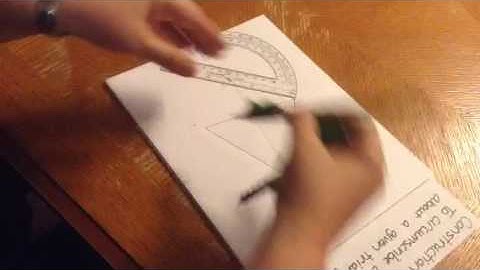 Circumscribe a circle about a given triangle; construction 12