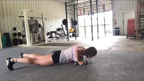 Push-up with dumbbell rotation