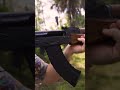 Shooting AK-47 in woods