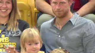 Sneaky toddler steals Prince Harry's popcorn
