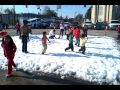 Kids snow ball fight.