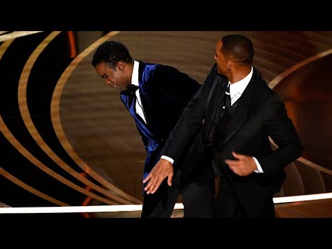 Watch the uncensored moment Will Smith smacks Chris Rock on stage at the Oscars, drops F-bomb Oscar